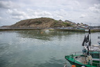   Port en Bessin-Huppain- au loin, la tour Vauban